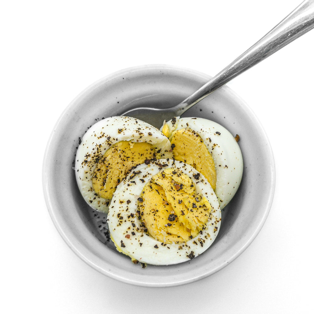 white ceramic bowl with yellow cream