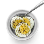 white ceramic bowl with yellow cream