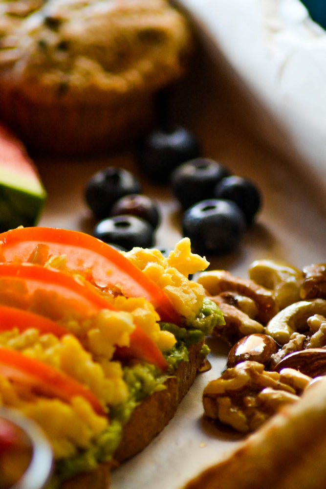 A close up of a sandwich with fruit and nuts