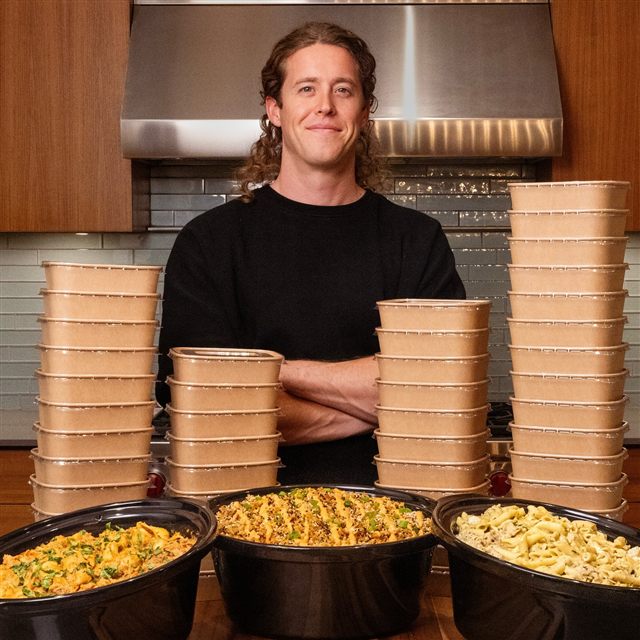 Tom Walsh with trays of his Taco Mac meal prep